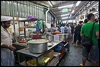 People waiting in line at popular eatery. George Town, Penang, Malaysia ( color)