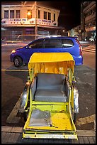 Rickshaw and auto at night. George Town, Penang, Malaysia ( color)