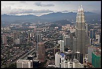 Skyline with Petronas Towers seen from Menara KL. Kuala Lumpur, Malaysia ( color)