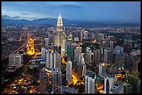 KL skyline with Petronas Towers from above, dusk. Kuala Lumpur, Malaysia (color)