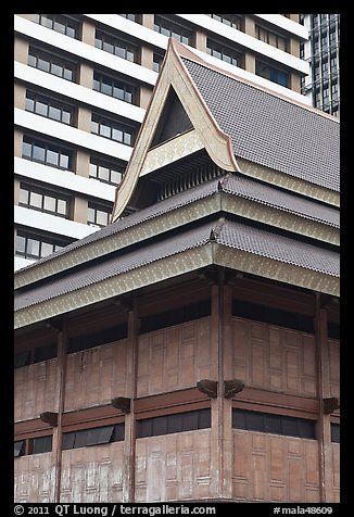 Tek house and modern buildings. Kuala Lumpur, Malaysia