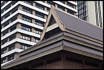 Roof of traditional tek house and modern buildings. Kuala Lumpur, Malaysia ( color)
