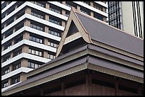 Roof of traditional tek house and modern buildings. Kuala Lumpur, Malaysia