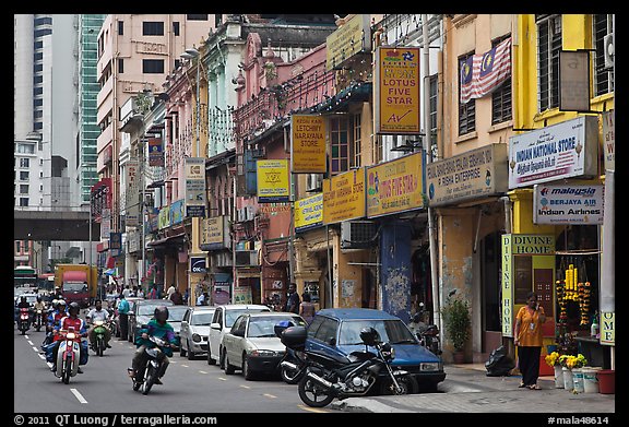 Motorcyles and shops, Little India. Kuala Lumpur, Malaysia (color)