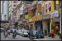 Motorcyles and shops, Little India. Kuala Lumpur, Malaysia ( color)