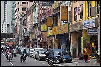 Motorcyles and shops, Little India. Kuala Lumpur, Malaysia (color)