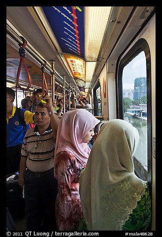 Inside Light Rail Transit (LRT) car. Kuala Lumpur, Malaysia (color)