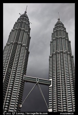 Petronas Towers (tallest twin towers in the world) and stormy sky. Kuala Lumpur, Malaysia (color)