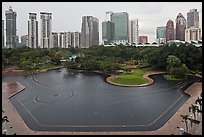 KLCC Park surrounded by high-rise towers. Kuala Lumpur, Malaysia ( color)