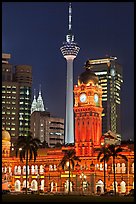 Sultan Abdul Samad Building, Petronas Towers, and Menara KL at night. Kuala Lumpur, Malaysia (color)