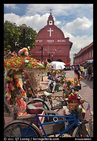 Malacca Town Square with trishaws and church. Malacca City, Malaysia (color)