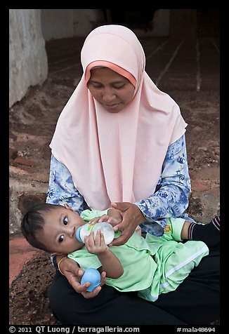 Mother and infant, St Paul Hill. Malacca City, Malaysia