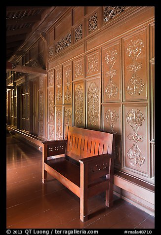 Wood panel and chair, sultanate palace. Malacca City, Malaysia