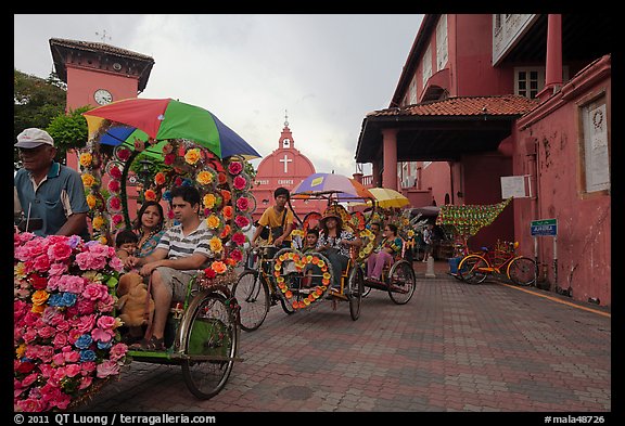 Trishaws leaving Town Square and Stadthuys. Malacca City, Malaysia