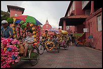 Trishaws leaving Town Square and Stadthuys. Malacca City, Malaysia ( color)