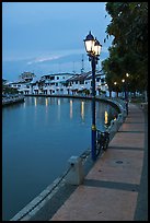 Melaka River river quay at dusk. Malacca City, Malaysia