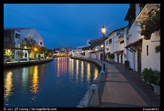 Houses and walkway at dusk, Melaka River. Malacca City, Malaysia (color)