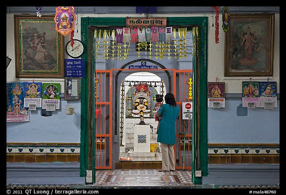 Women worshipping Hindu deity Vinayaga, Sri Poyyatha Vinayagar Moorthi. Malacca City, Malaysia