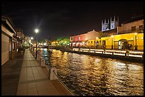 Melaka River at night with St Peters Church towers. Malacca City, Malaysia