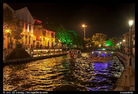 Tour boats on Melaka River at night. Malacca City, Malaysia (color)