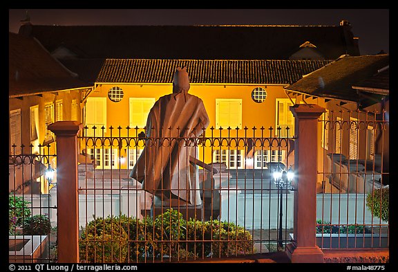 Statue and Stadthuys at night. Malacca City, Malaysia (color)