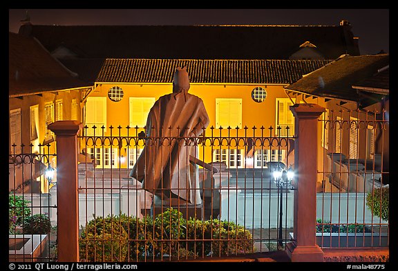 Statue and Stadthuys at night. Malacca City, Malaysia