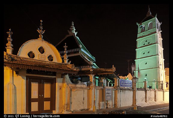 Gate, Mosque, and minaret, Masjid Kampung Hulu at night. Malacca City, Malaysia