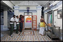 Worhipers and holy man, Sri Poyyatha Vinayagar Moorthi Temple. Malacca City, Malaysia ( color)