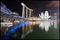 Helix Bridge, Marina Bay Sands, and ArtScience Museum at night. Singapore (color)