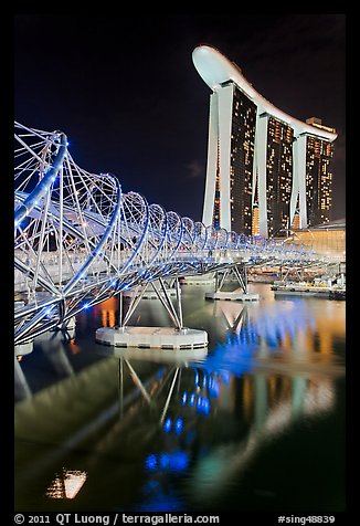 Helix Bridge and Marina Bay Sands hotel at night. Singapore (color)