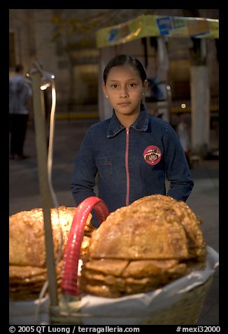 Young street food vendor by night. Guadalajara, Jalisco, Mexico (color)