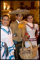 Man with sombrero hat surrounded by  two women. Guadalajara, Jalisco, Mexico