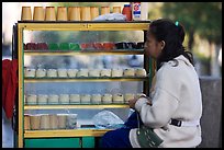 Woman selling dairy desserts on the street. Guadalajara, Jalisco, Mexico