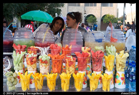 Cups of fresh fruits offered for sale on the street. Guadalajara, Jalisco, Mexico