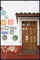 Wall decorated with colorful ceramic pieces, Tlaquepaque. Jalisco, Mexico ( color)