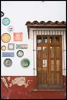 Wall decorated with colorful ceramic pieces, Tlaquepaque. Jalisco, Mexico (color)