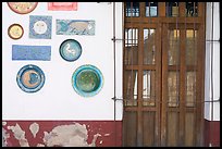 Wall decorated with colorful ceramic pieces, Tlaquepaque. Jalisco, Mexico ( color)