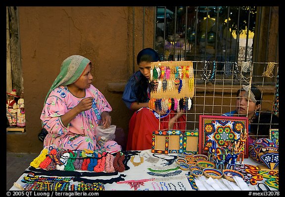 Huichol women selling crafts on the street, Tlaquepaque. Jalisco, Mexico