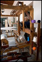 Traditional weaver and machine seen from the side, Tlaquepaque. Jalisco, Mexico ( color)