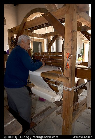 Traditional weaver and machine seen from the back, Tlaquepaque. Jalisco, Mexico (color)