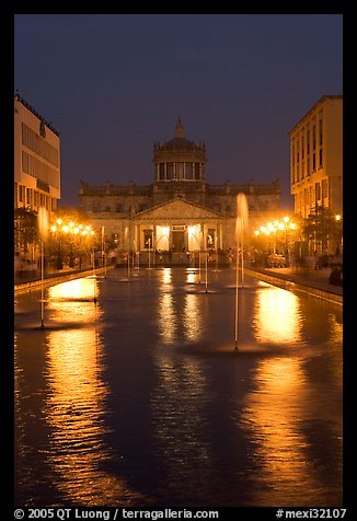 Plaza Tapatia at night with Hospicio Cabanas reflected in basin. Guadalajara, Jalisco, Mexico