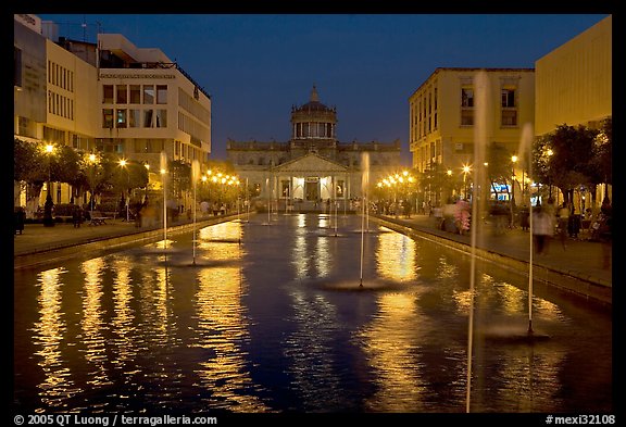 Plaza Tapatia at night with Hospicio Cabanas reflected in basin. Guadalajara, Jalisco, Mexico (color)