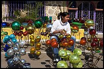 Woman polishing glass spheres, Tonala. Jalisco, Mexico