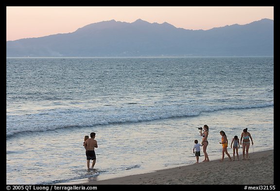 Family on the beach at sunset, Nuevo Vallarta, Nayarit. Jalisco, Mexico (color)