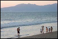 Family on the beach at sunset, Nuevo Vallarta, Nayarit. Jalisco, Mexico (color)