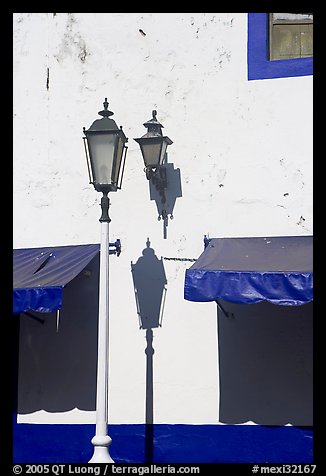 Wall with lamps, blue shades and blue painting, Puerto Vallarta, Jalisco. Jalisco, Mexico (color)