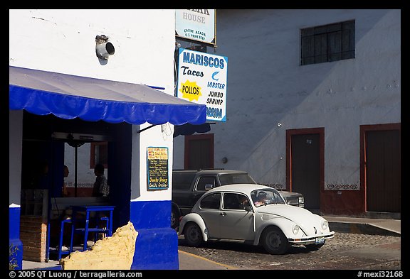 Restaurant at a street corner and Mexico made Wolskwagen bug, Puerto Vallarta, Jalisco. Jalisco, Mexico