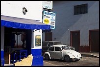 Restaurant at a street corner and Mexico made Wolskwagen bug, Puerto Vallarta, Jalisco. Jalisco, Mexico (color)