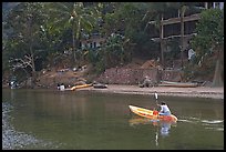 Woman using a canoe in a village,  Boca de Tomatlan, Jalisco. Jalisco, Mexico ( color)