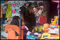 Woman and girl outside a store,  Boca de Tomatlan, Jalisco. Jalisco, Mexico (color)